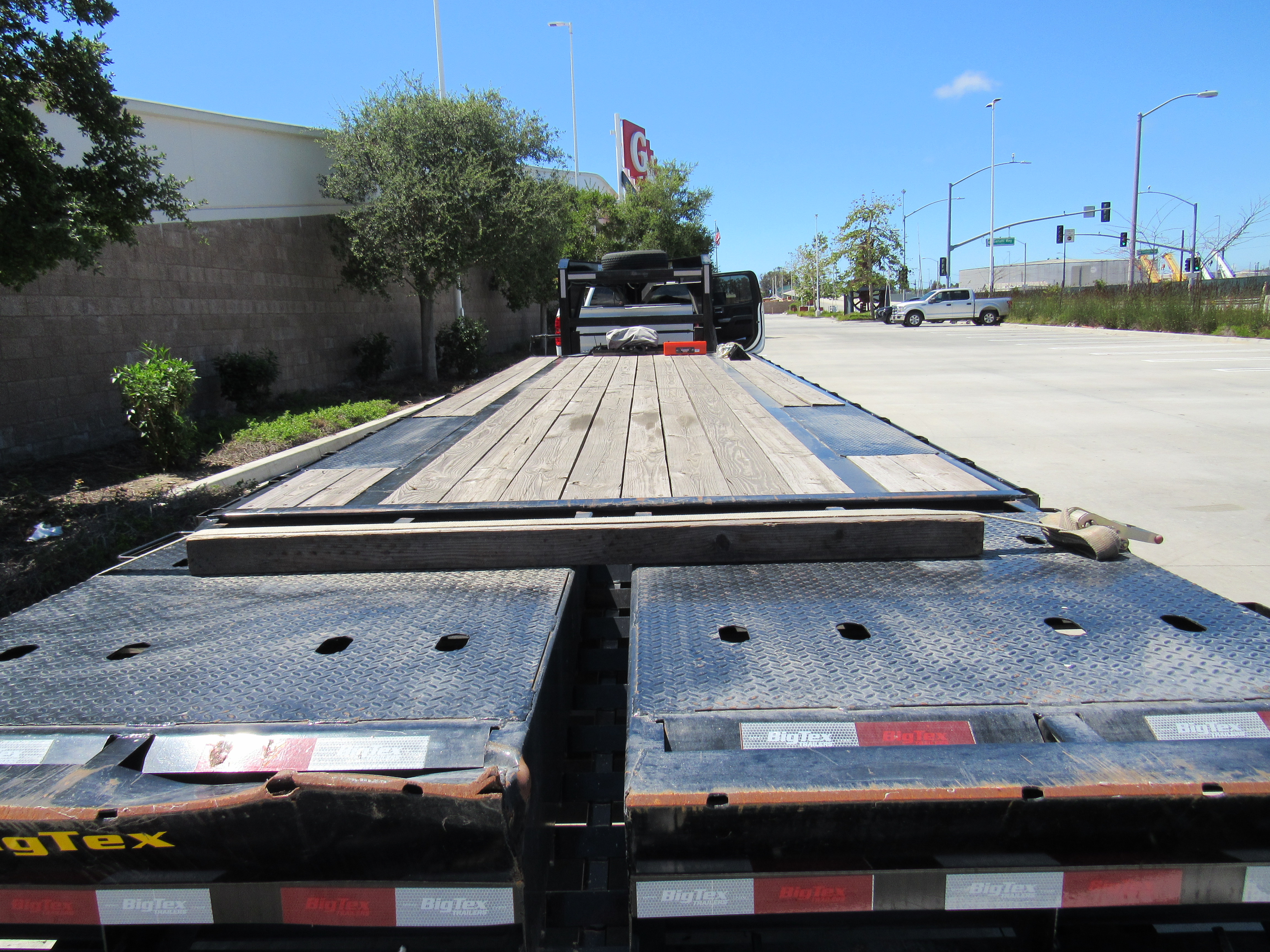 Big Tex flatbed trailer bed rear view showing the full deck and equipment